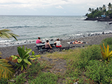 People recreating on a Hawaiian beach. Credit - NOAA